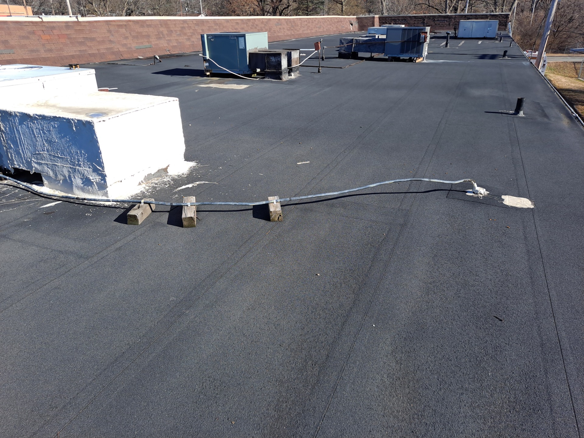 Scott Lee Heating Company Roof Top Before Photo